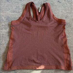 Women’s Athleta tank top
Size 1X
Color rust colored